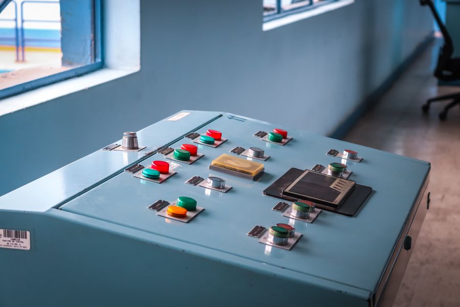 Industrial control console with operating buttons